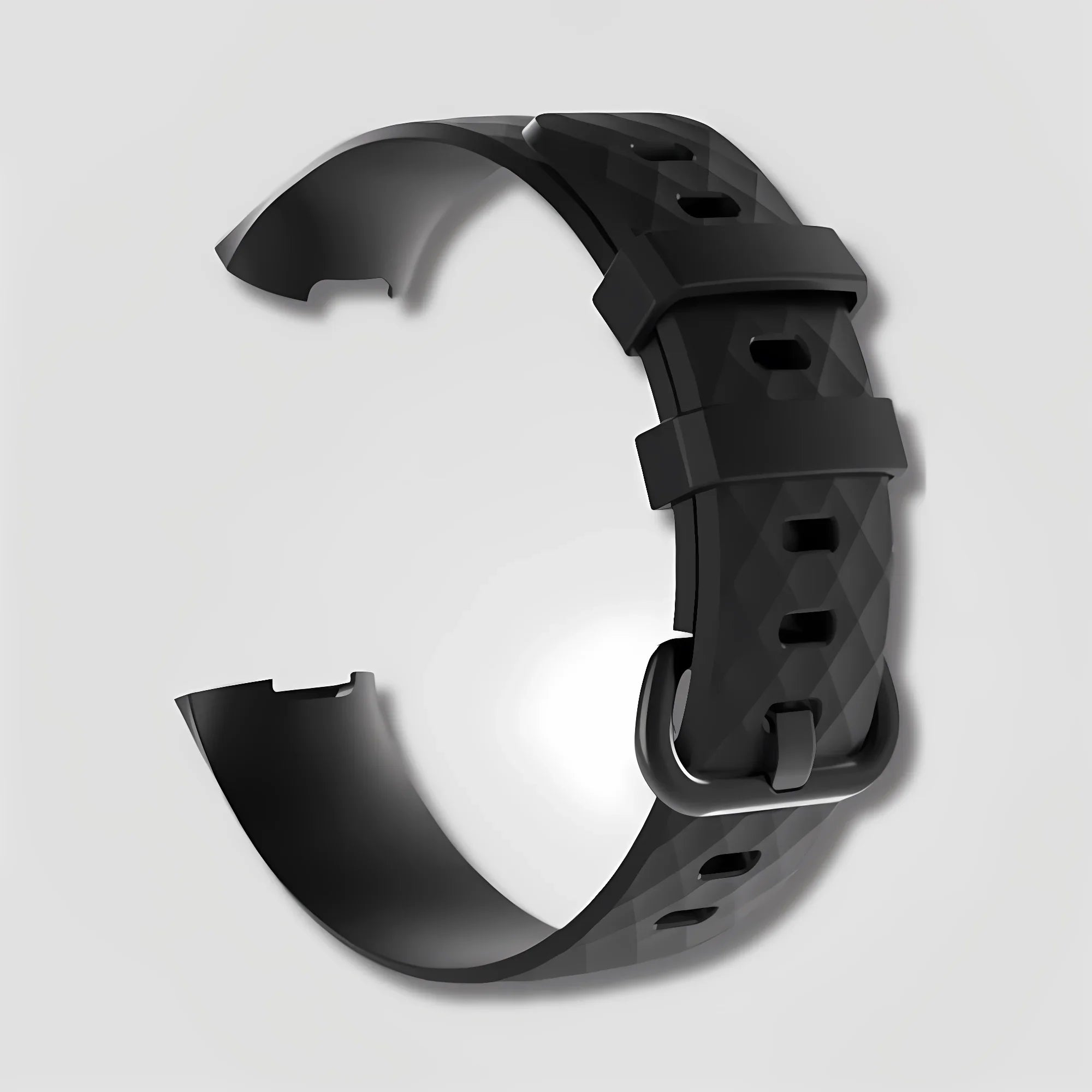 Black silicone watch strap with geometric texture and buckle on white background