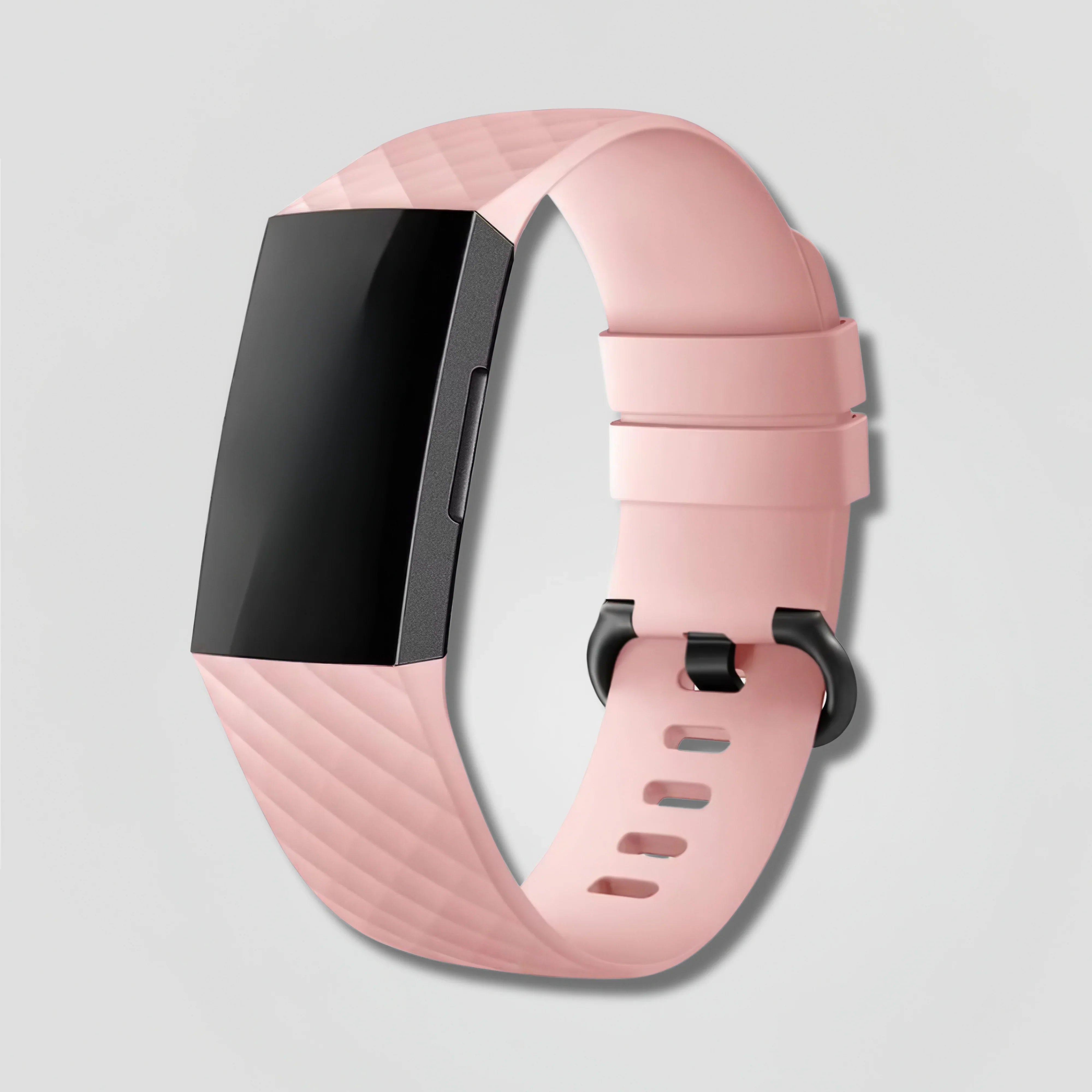 Image of Light pink textured silicone band for Fitbit Charge 5 fitness tracker on gray background