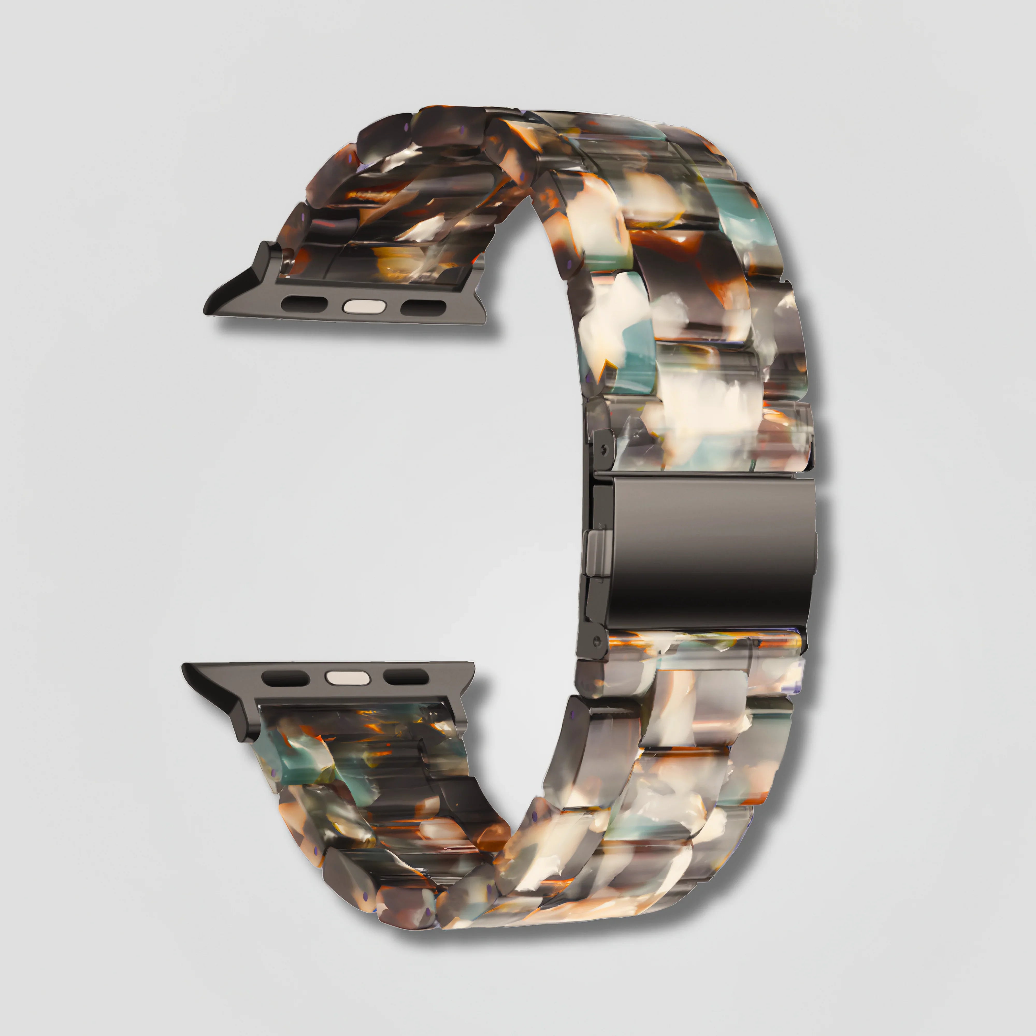 Tortoiseshell resin composite Apple Watch band with stainless steel clasp on gray background