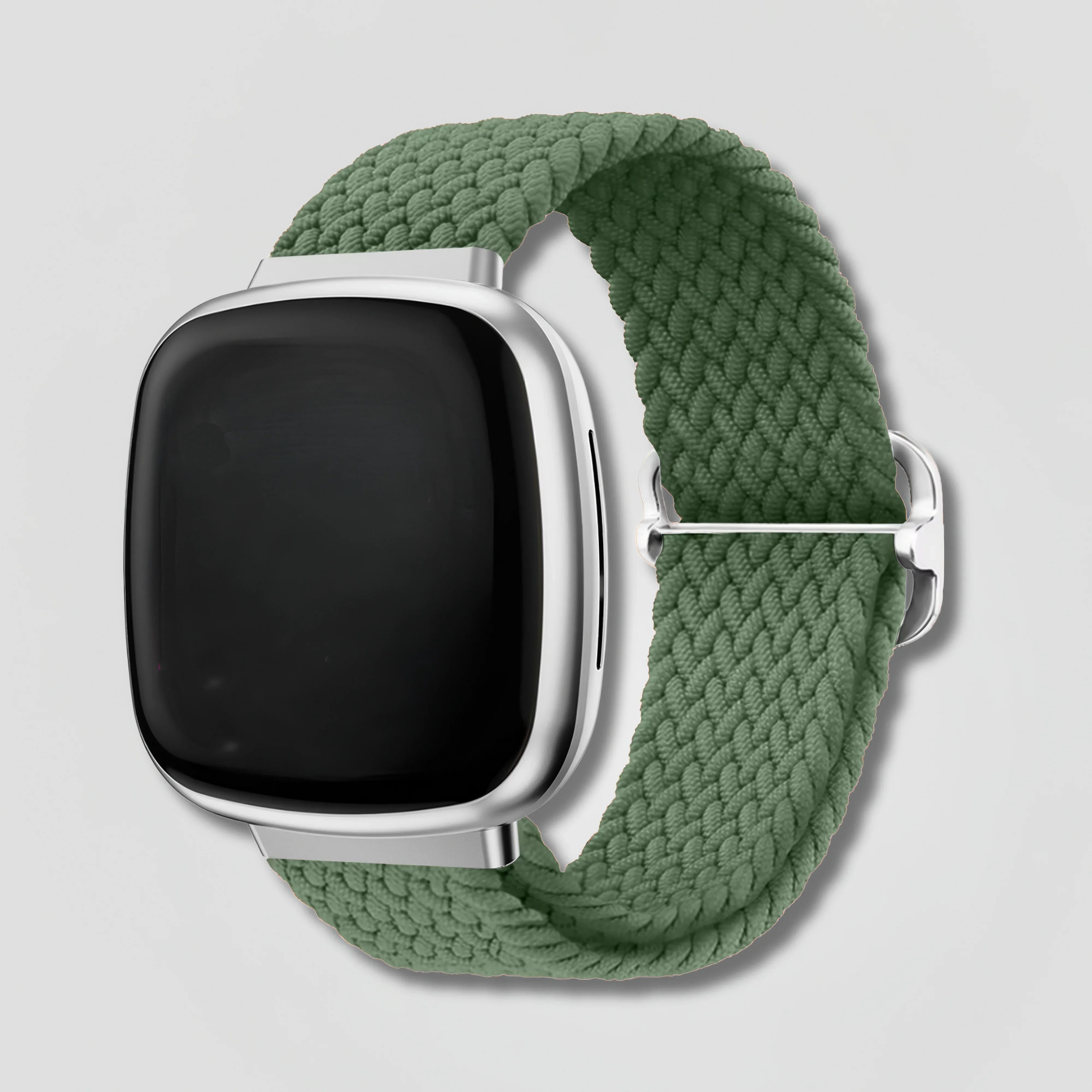 Image of Fitbit smartwatch with olive green braided loop band on light background