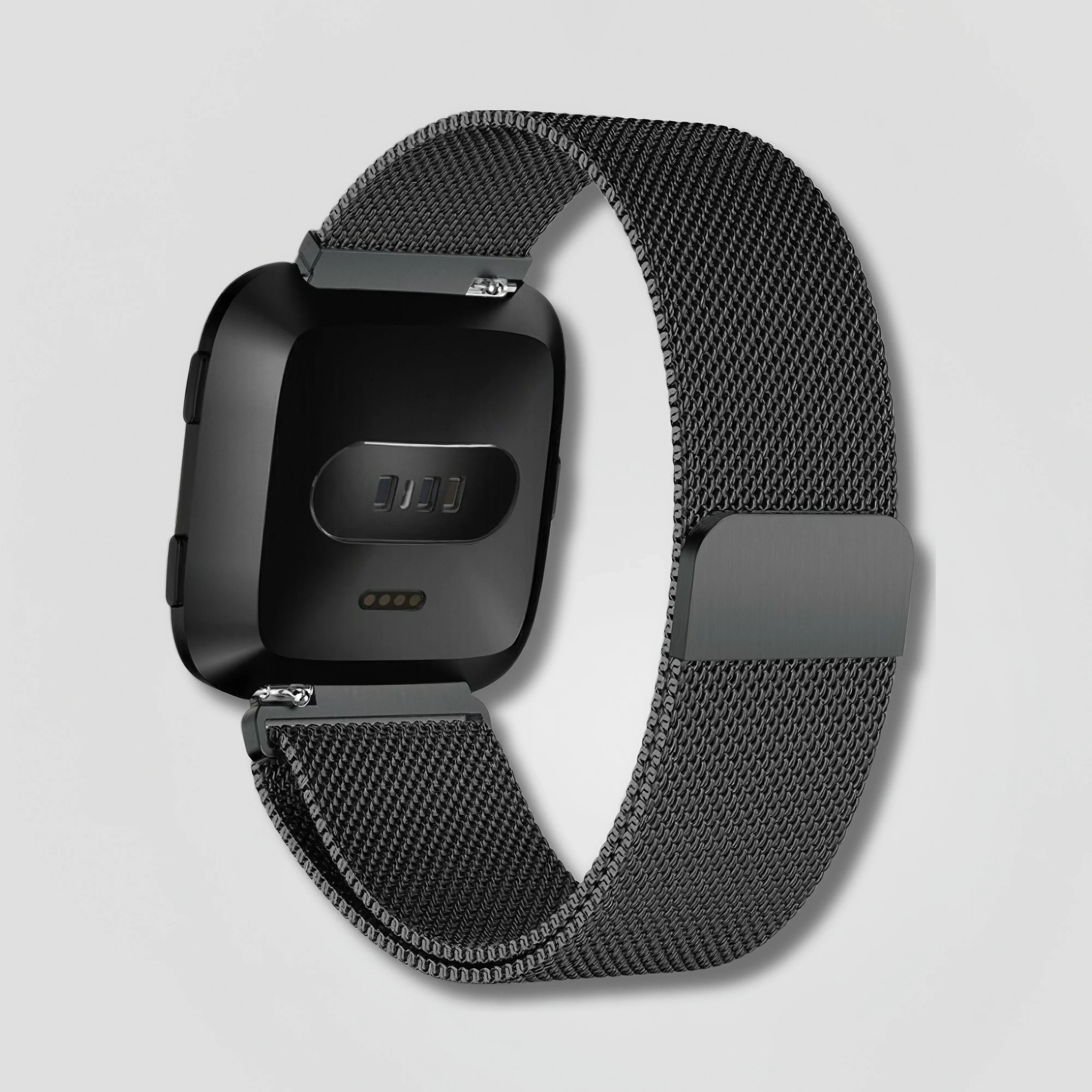 Black smart watch with magnetic Milanese loop band on white background