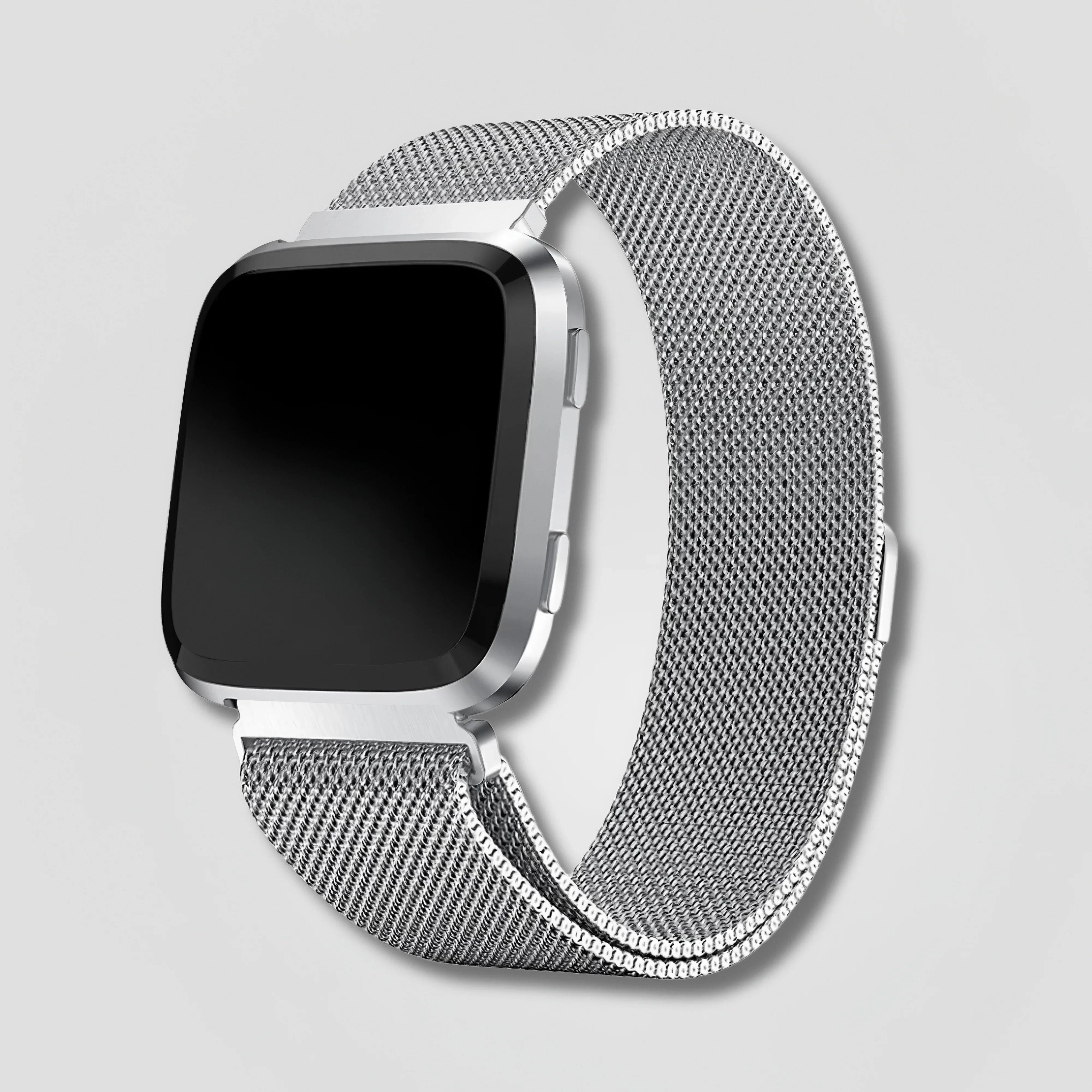 Silver mesh smart watch with square black screen on a light gray background