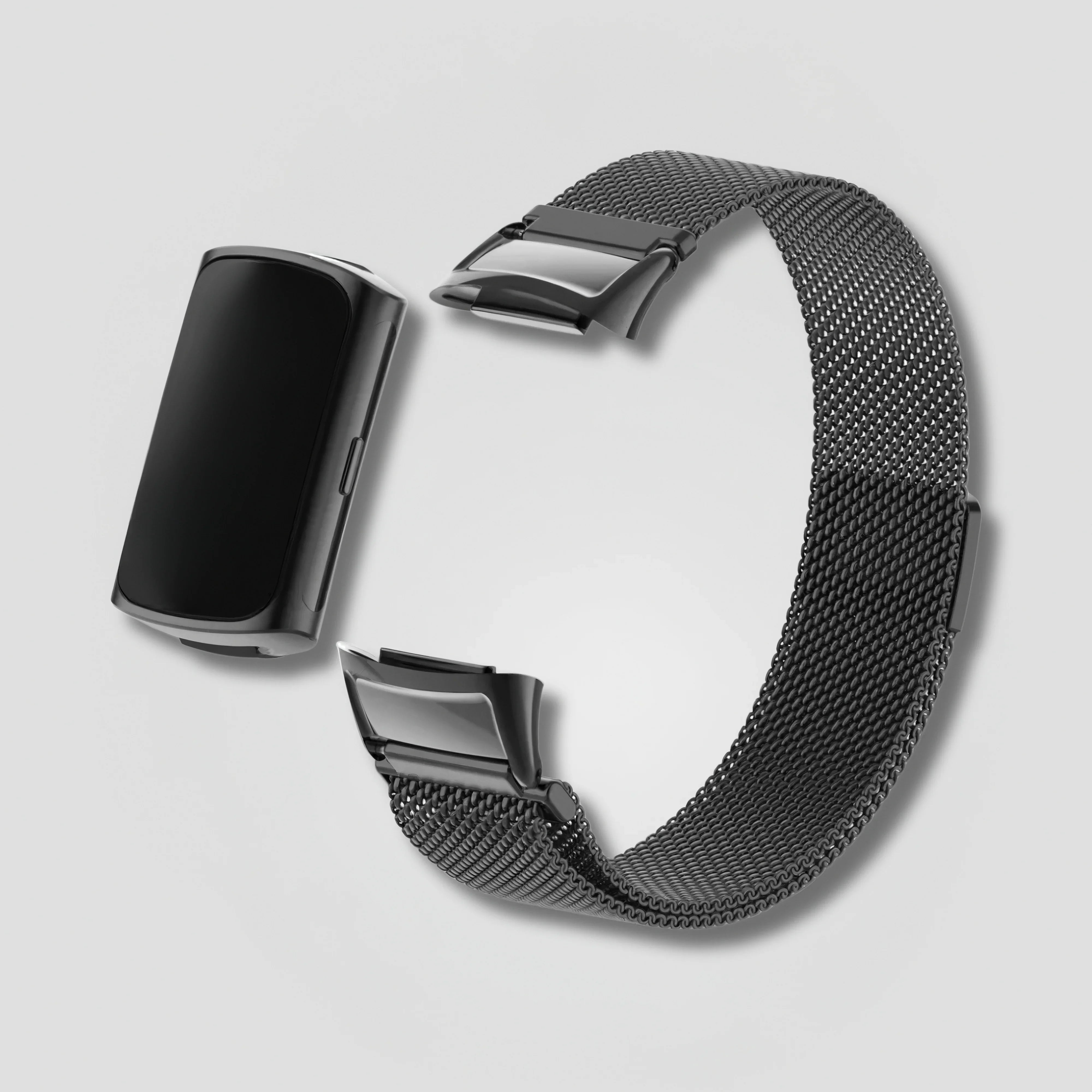 Image of Black magnetic Milanese band for Fitbit Charge 5 and 6, separated from tracker, on white background.