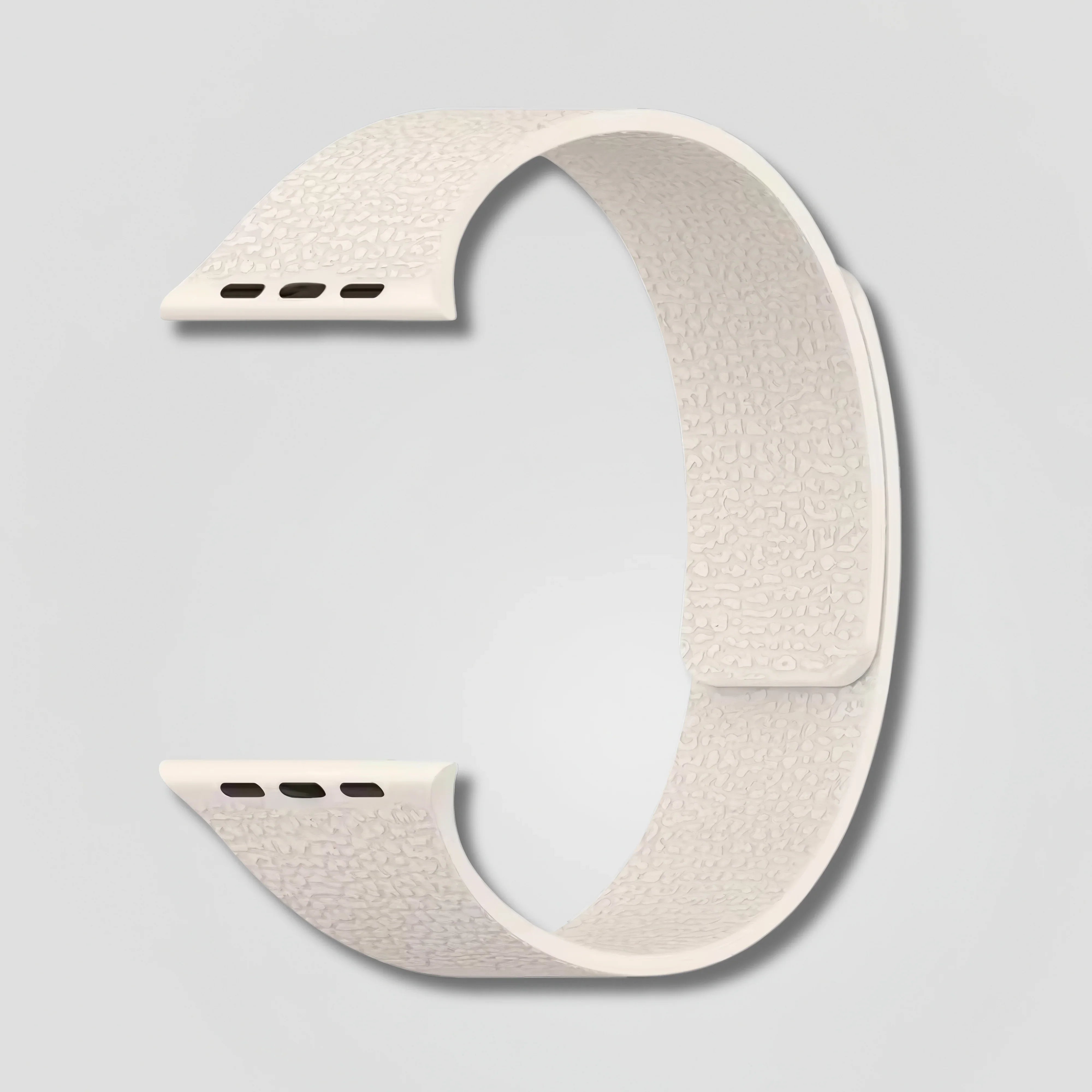 Image of Ivory Sera Magnetic Loop Apple Watch band with textured finish, isolated on gray background