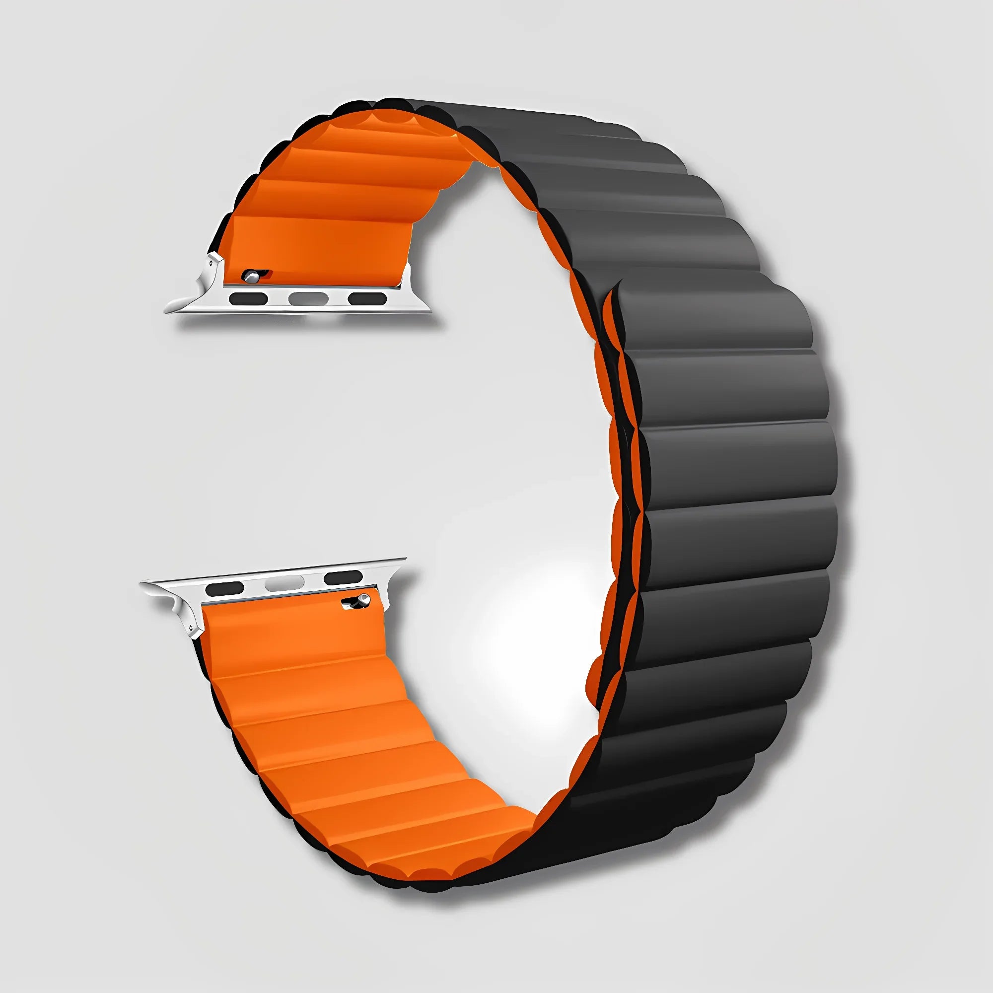 Black and orange magnetic silicone Apple Watch band on white background